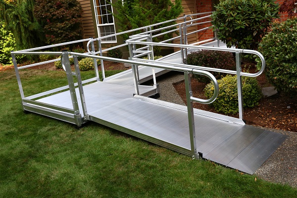 Aluminum ramp with handrails.