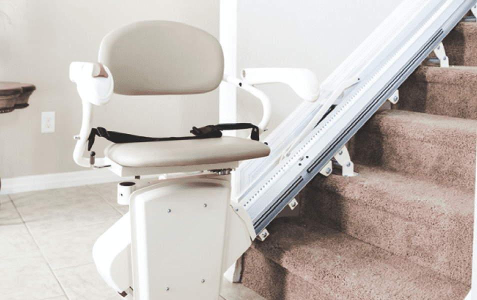 Stairlift installed on a residential staircase.