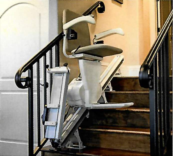 A stairlift installed on a staircase.