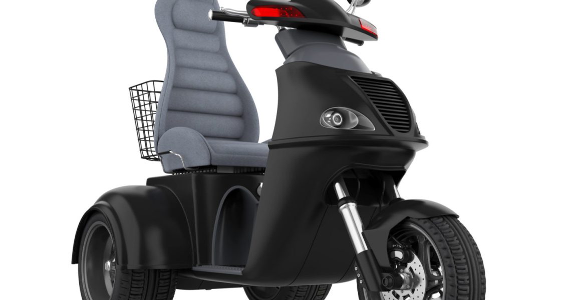 Mobility scooter with a front basket isolated on a white background.